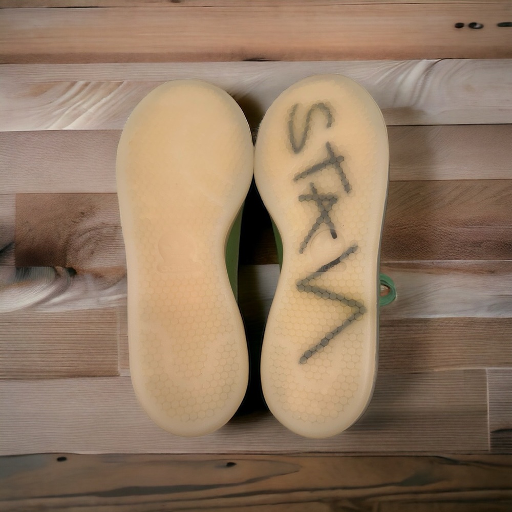 Toy Story’s Rex covers The adidas Stan Smith in Prehistoric Leather Uppers